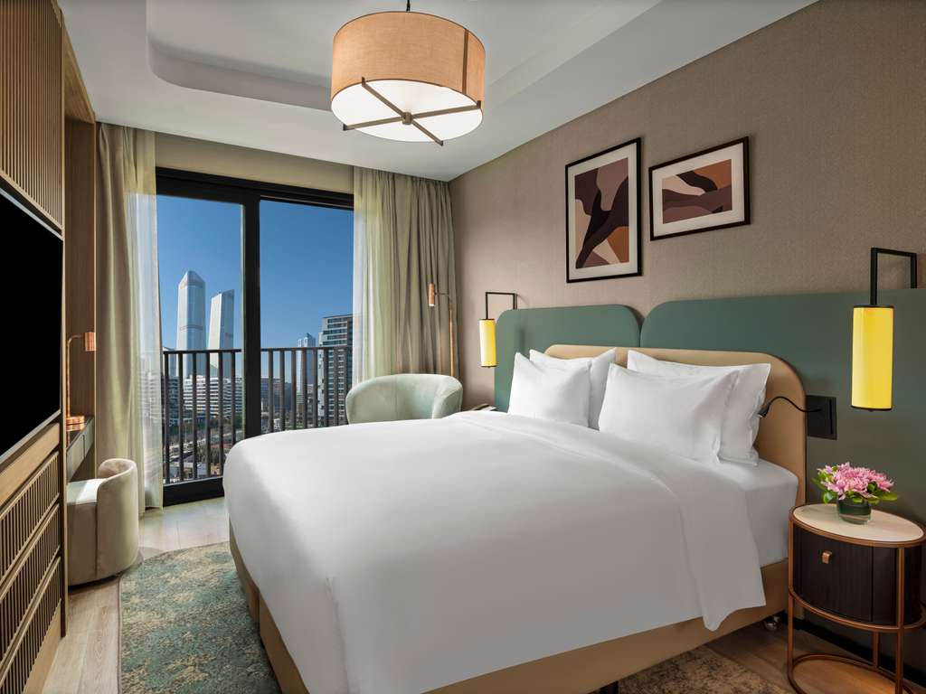 Mövenpick Living Saklıvadi — oda ve yaşam alanı
